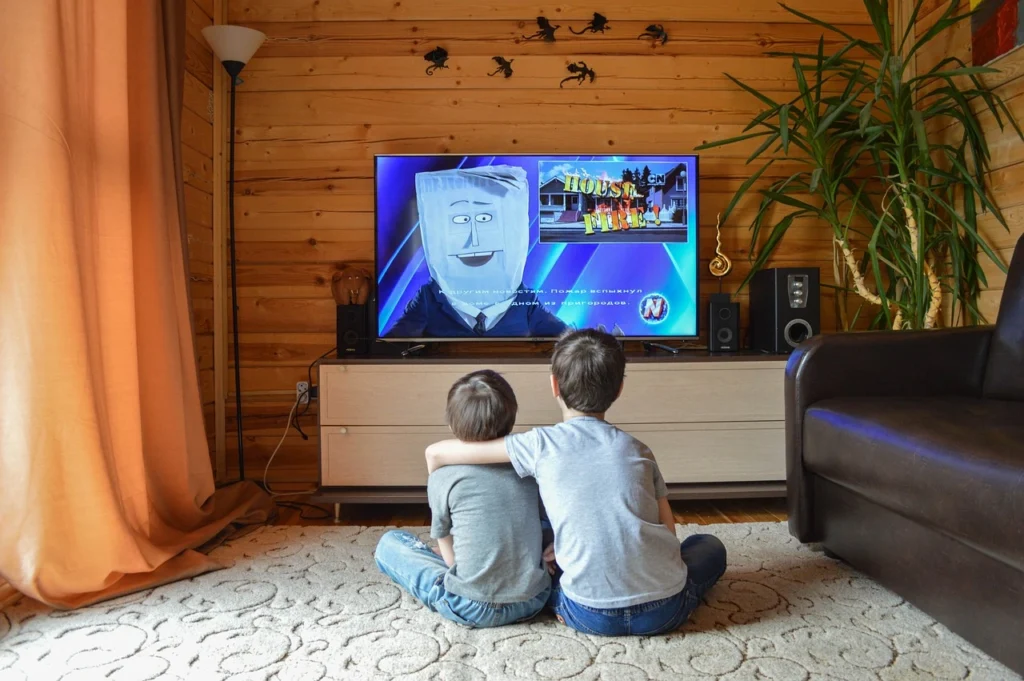 happy kids watching tv